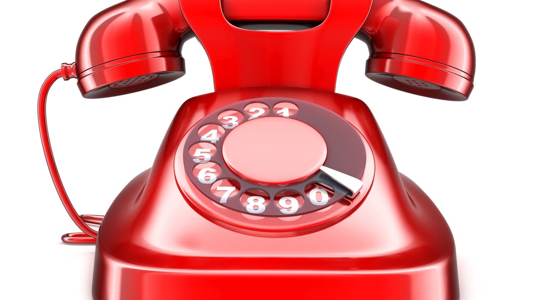 23661462-red-old-telephone.jpg