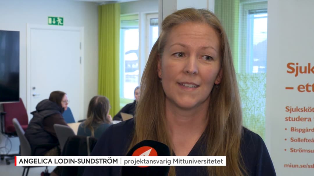 Kvinna blir intervjuad av TV-kanal.