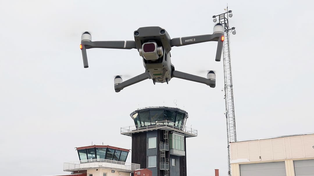 A drone taking off at an airport