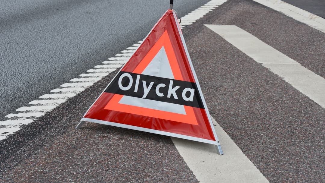 Varningstriangel med texten olycka.