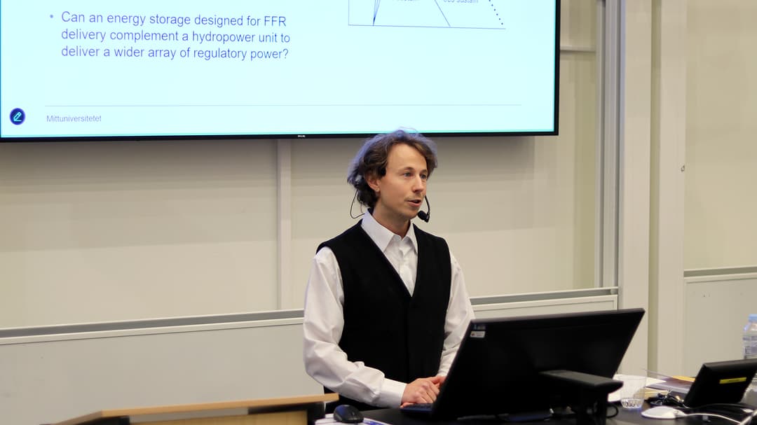 A man is giving a presentation.