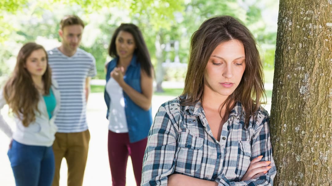 10721058-lonely-student-being-bullied-by-her-peers.jpg