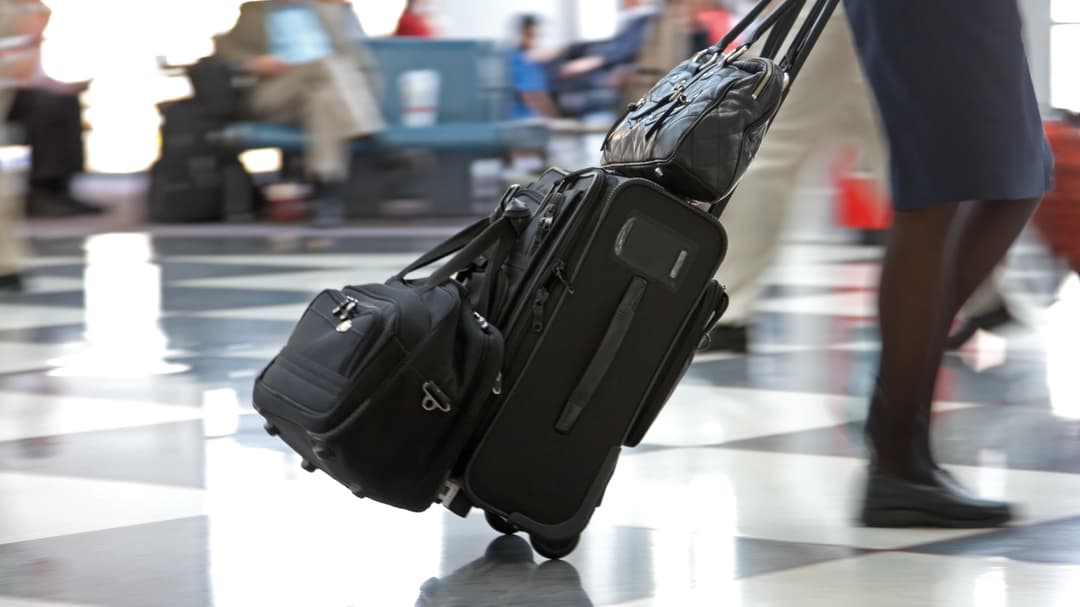 40920-airport-terminal-and-travellers.jpg