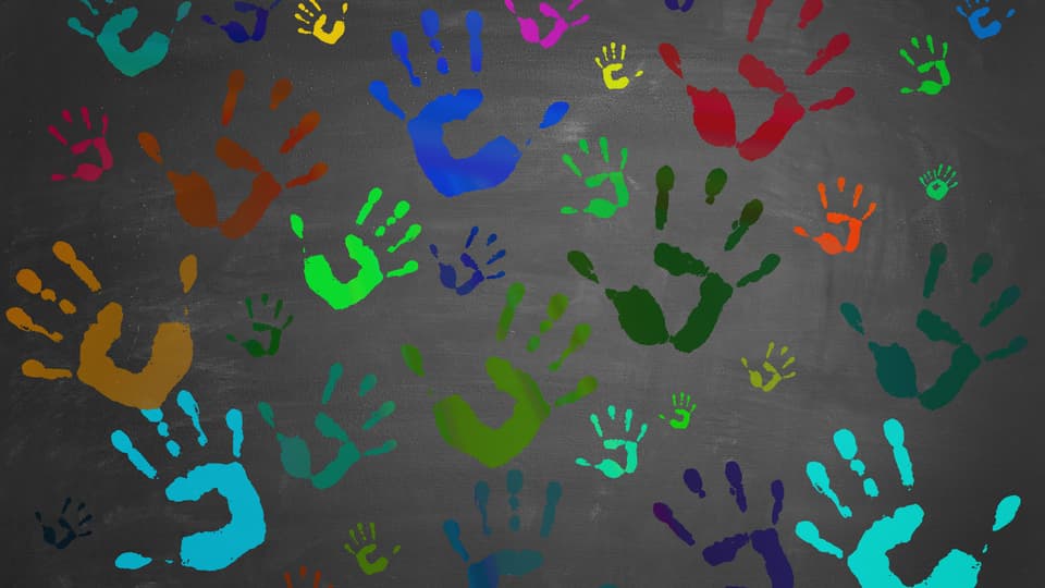 15360907-painted-hands-printed-on-blackboard.jpg