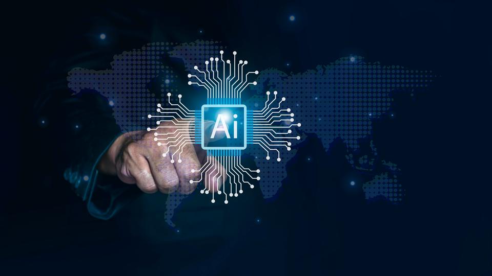 A hand pointing to the text ‘AI’ written in a light blue square with several light rays in white extending outwards from the sides of the square.  