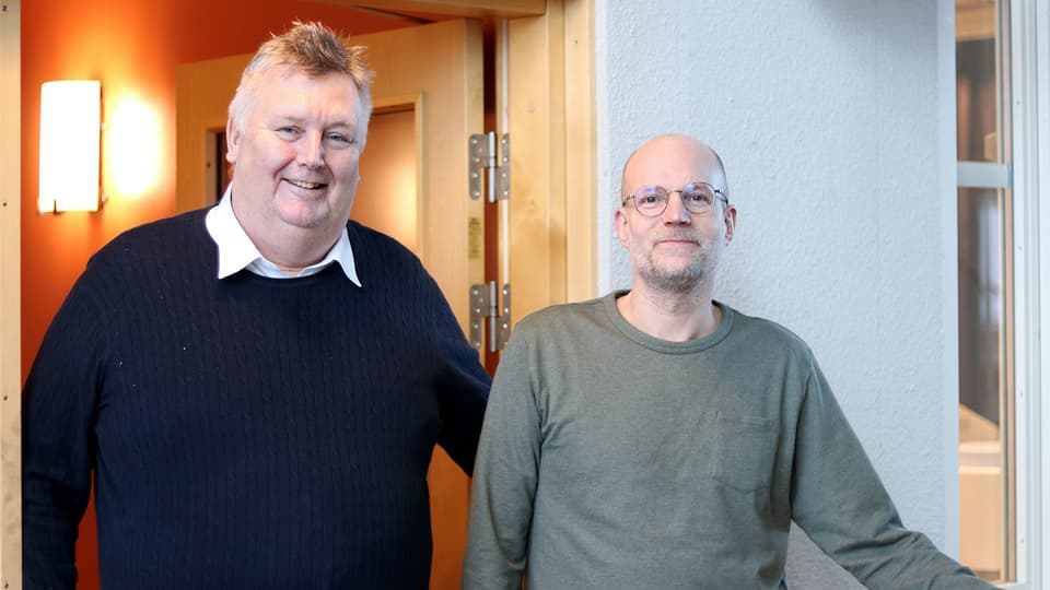 Portrait of two men.