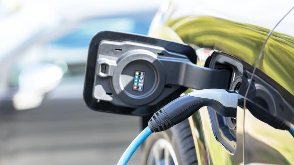 A car charger placed in a car