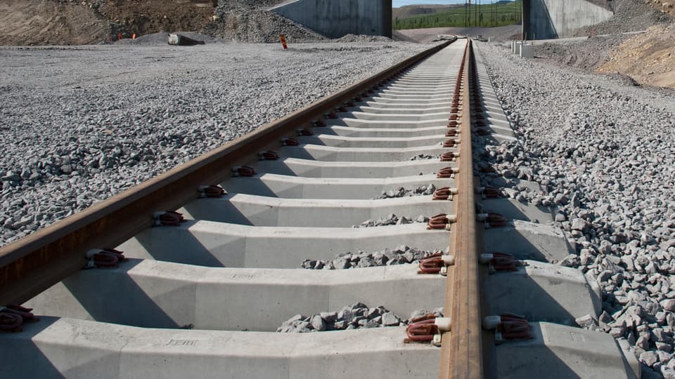 Railway surrounded by crushed stone.