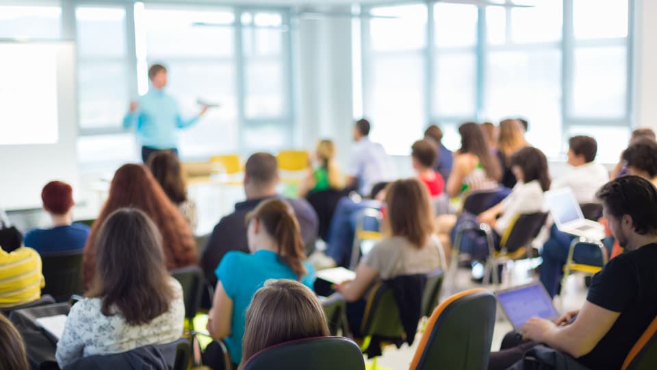 speaker at business convention and presentation