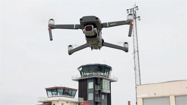 A drone taking off at an airport